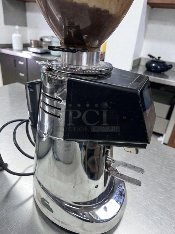 Fiorenzato F64E XGi espresso grinder, shiny chrome finish, electronic doser, premium condition, fully operational, ETL listed.