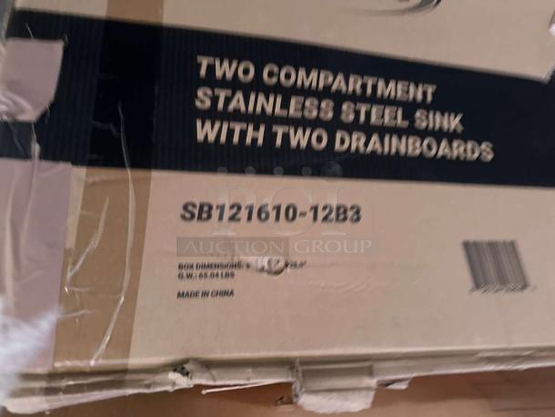 Brand new KoolMore SB121610-12B3 stainless steel two-compartment sink with dual drainboards, NSF certified, in original packaging.