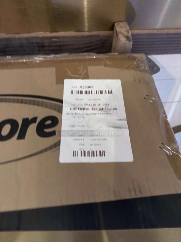 Brand new KoolMore SB121610-12B3, commercial stainless steel sink with dual drainboards, NSF certified, in original box.