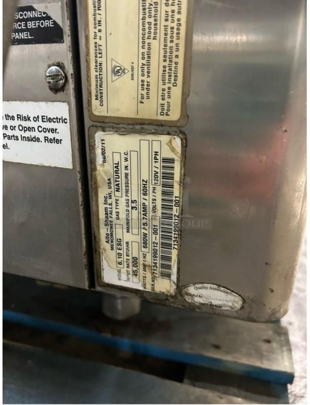 Alto-Shaam 6-10ESG PRO combi oven label, showing electrical specs and quality assurance mark; tested and working condition.