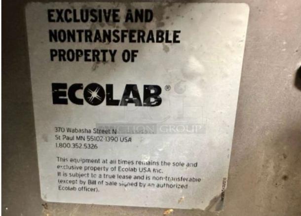 CMA/Ecolab ES-2000 dishmachine label, showing "Exclusive and Nontransferable Property of Ecolab," with contact details.
