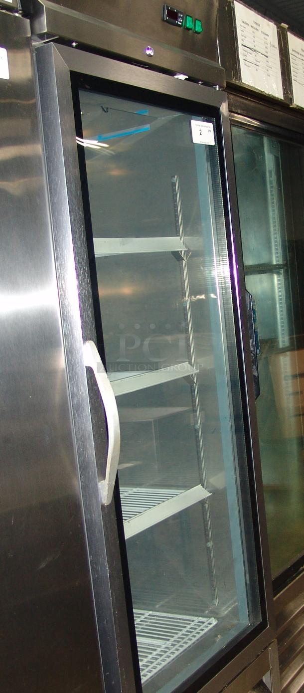 Maxximum MXCR-23GDHC 29" stainless steel reach-in refrigerator, 23 cu ft, glass door, shelving intact, model tag visible.