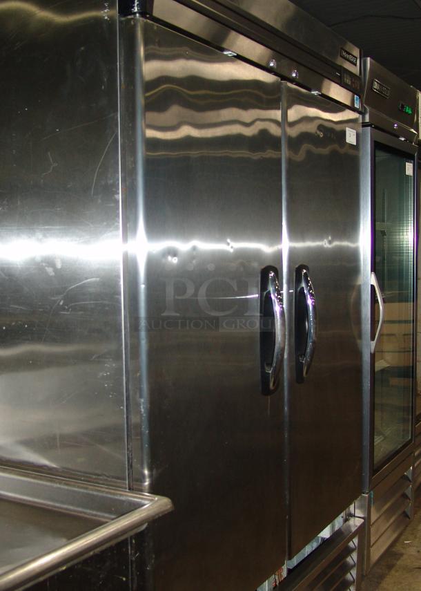 Premium condition Norlake AdvantEdge R49-S stainless steel 2-door cooler, polished finish, durable handles.