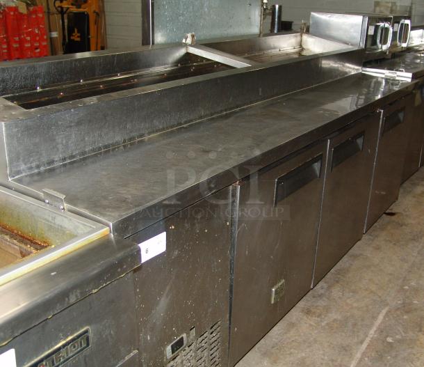 Kelvinator KCPT92.12 pizza prep table, 24 cu. ft., stainless steel, used condition, featuring multiple compartments.