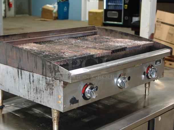 Star Gas Charbroiler KCPT92.12, 36"Wx25-3/4"Dx15-1/2"H, 120,000 BTU. Heavy-duty, used condition, three control knobs.