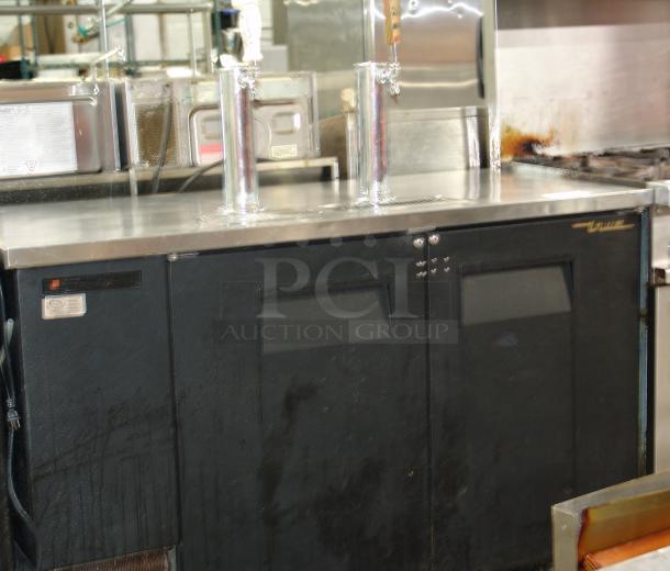True TDD-2 beer dispenser, black, 58-7/8"W, dual taps, stainless top, great condition. Visible True logo and model label.
