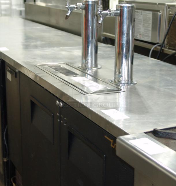 True TDD-2 black beer dispenser, 58-7/8" wide, excellent condition, stainless taps, ideal for commercial use.