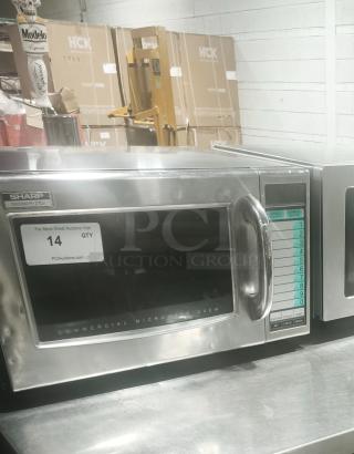 Sharp R21LVF stainless steel commercial microwave, 1,000W, 120V, touch controls, 10 programmable memories, in good condition.