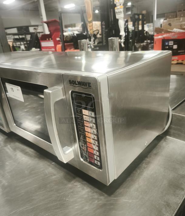 Solwave EM025FJT-S0SA00 stainless steel commercial microwave, 1000W, push button controls, good condition.