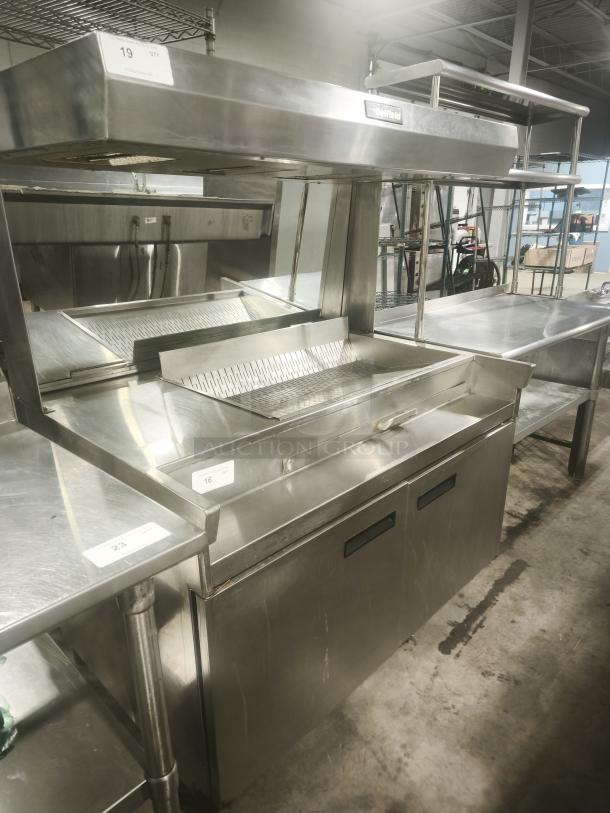 Delfield commercial refrigerator sandwich prep table, stainless steel, dual doors, excellent condition, label visible.