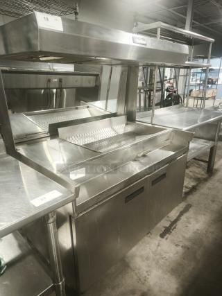 Delfield commercial refrigerator sandwich prep table, stainless steel, dual doors, excellent condition, label visible.
