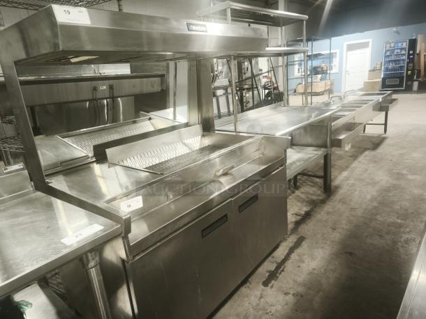 Delfield commercial refrigerator sandwich prep table, stainless steel, multiple compartments, slightly used condition.