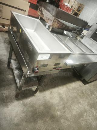 Delfield 1500W Electric Countertop Food Warmer, model FW-1500W, in exceptional condition, stainless steel finish.