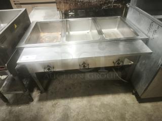 Delfield commercial 3-pan steam table in premium condition with visible control knobs. Ideal for hot food holding.