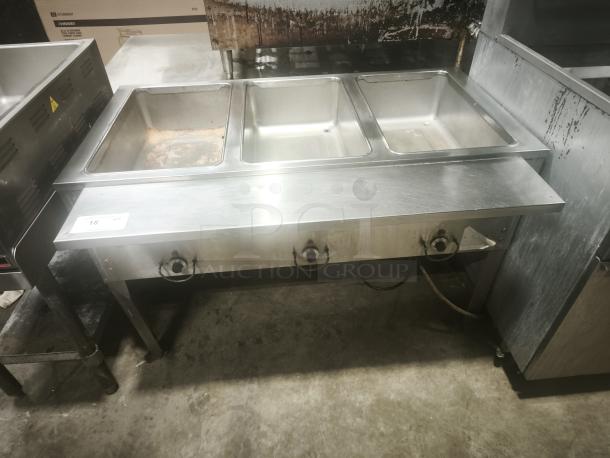 Delfield commercial 3-pan steam table, premium condition, stainless steel construction, used for hot food holding.