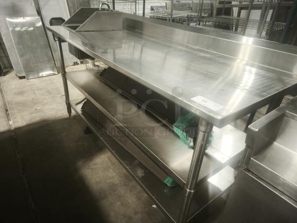 Commercial stainless steel prep table with sink, double undershelf, excellent condition, durable and spacious design.