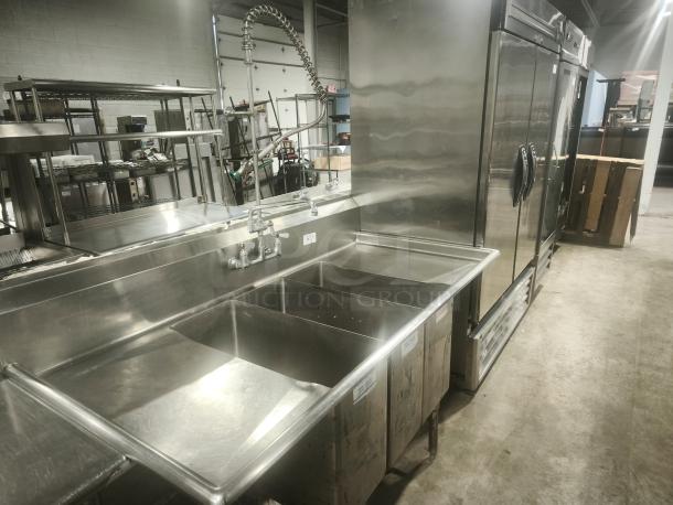 Heavy duty stainless steel butcher 3-compartment sink; excellent condition, industrial faucet, ideal for commercial kitchens.