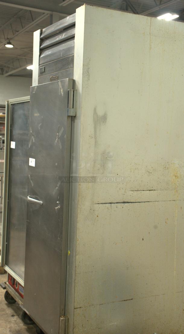 Traulsen G12010 reach-in freezer, stainless steel, right hinge door, 29 7/8" wide, excellent condition.
