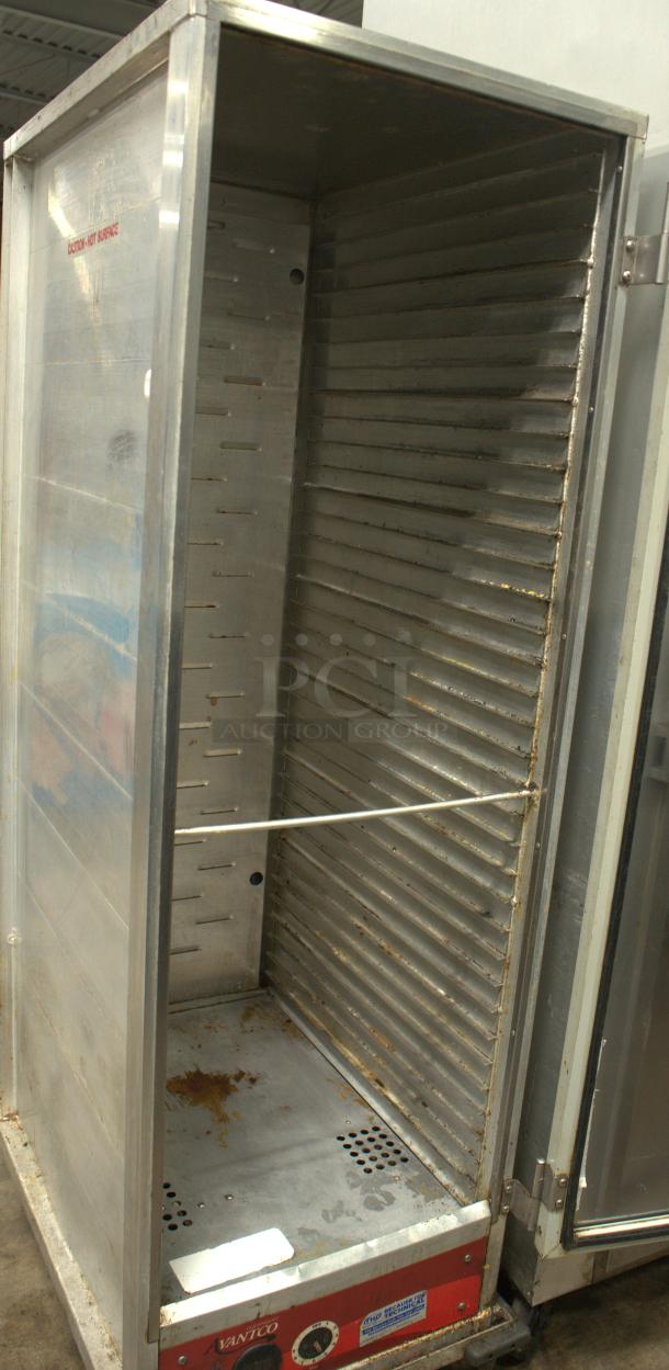 Avantco HEAT-1836I insulated heated holding cabinet with clear door, showing interior shelves and controls; used condition.