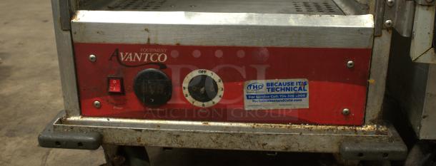 Avantco HEAT-1836I insulated heated holding cabinet, clear door, 120V, digital temperature controls, visible wear, service label attached.