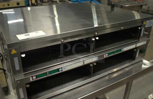 Prince Castle Dual Pass-Through Holding Bin, Model DHB2PT-33KFCB, in excellent condition with visible controls and labels.