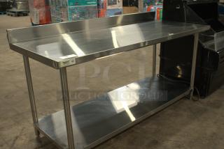 Heavy-duty commercial work table, 24"x60", 18-gauge 304 stainless steel, galvanized legs, undershelf, excellent condition.