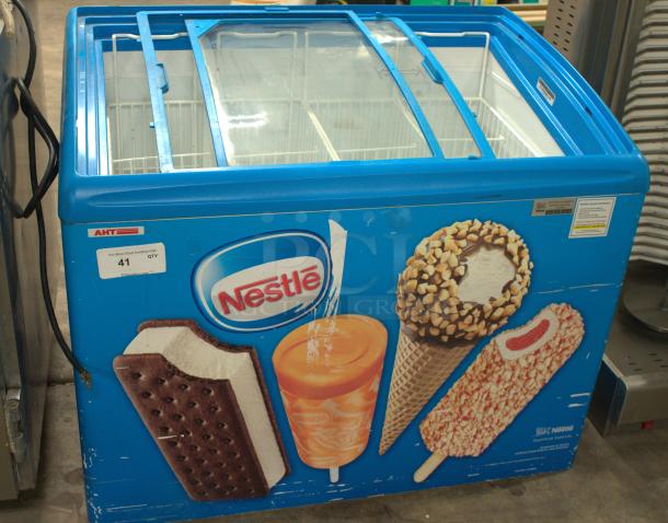 AHT RIO S 100 sliding glass top ice cream freezer, premium condition, Nestlé branding, for commercial use.
