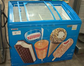 AHT RIO S 100 sliding glass top ice cream freezer, premium condition, Nestlé branding, for commercial use.