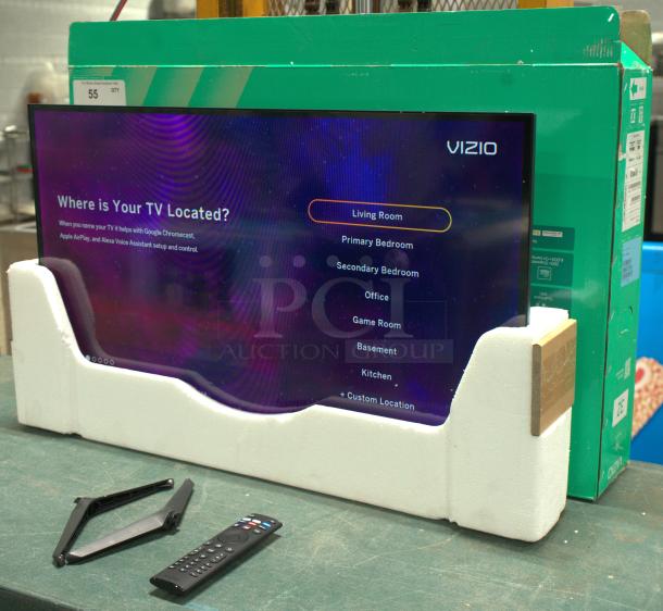 Brand new VIZIO 32" Class HD LED Smart TV, in packaging with remote and stand. Ideal for various room settings.