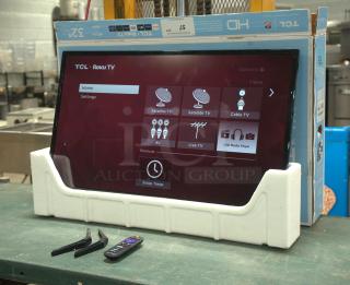 Brand new TCL 32” S3 (32S331) 720p HD LED Smart TV with Roku TV, shown with packaging and accessories.