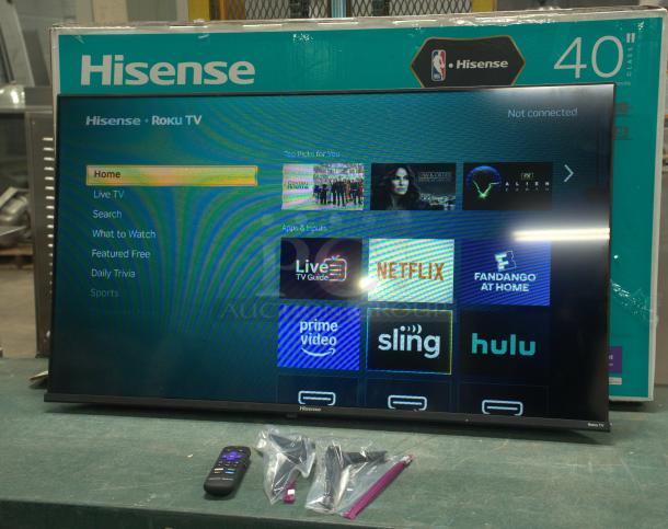 Brand new Hisense 43" 4K UHD LED LCD Smart Roku TV, model 43R6E3, with remote in original packaging.