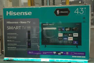 Brand new Hisense 43" Class 4K UHD LED LCD Smart Roku TV HDR R6 Series 43R6E3 in box, featuring Dolby Audio and slim bezel.