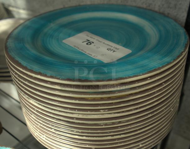 Carlisle 11" round melamine bread & butter plate, aqua color, stack of plates, auction tag reading "76", good condition.