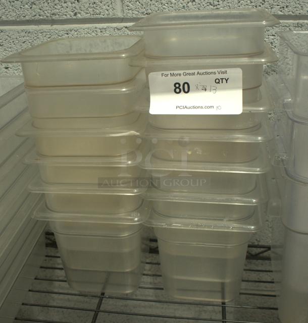 Clear plastic 1/6 size cold food storage containers, heavy duty, stackable, in good condition. Auction tag shows quantity 80.