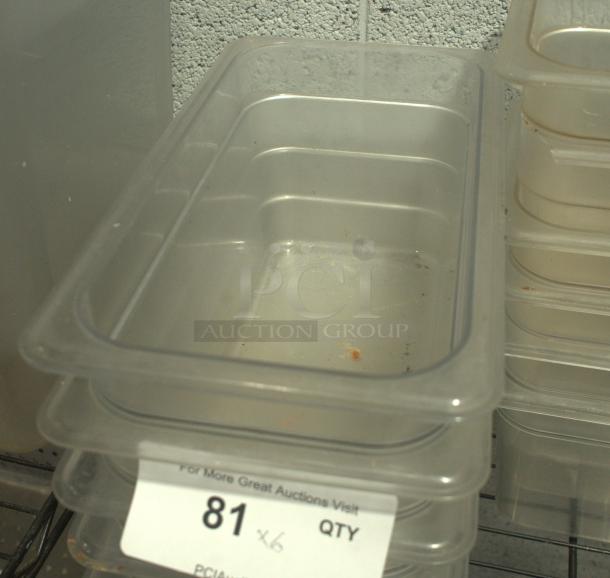 1/3 Size 4 Inch Deep Clear Polycarbonate NSF Food Pan, stack of six. Used condition, marked "81 QTY 6" on label.