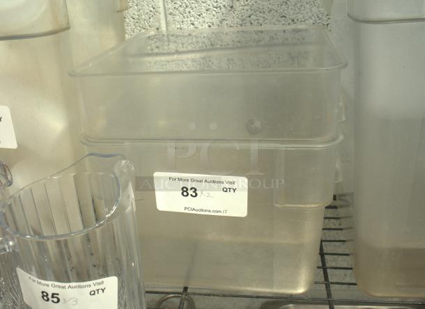 Cambro clear plastic storage box, heavy-duty, gently used. Label indicates auction lot number 83, quantity 2.