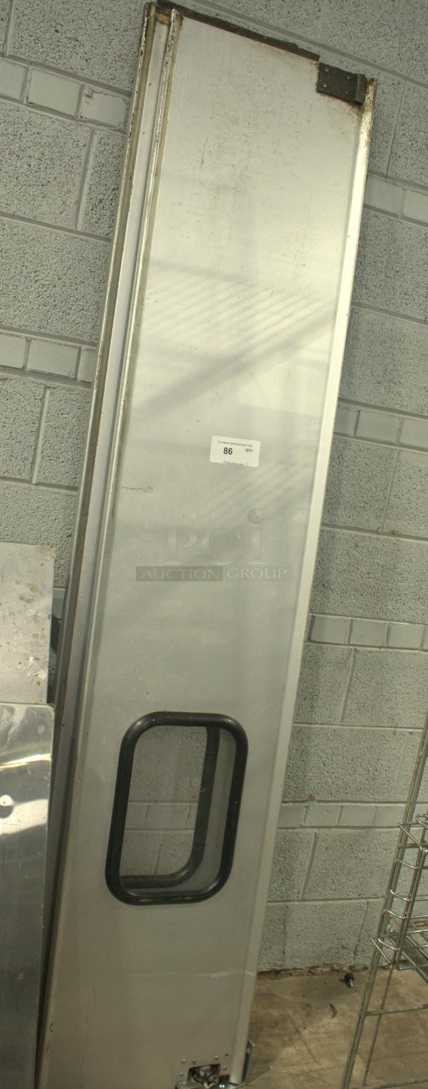 Heavy-duty aluminum swing door set; features glass window insert, visible wear, item tag labeled "86 QTY."