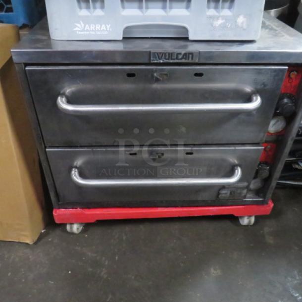 Vulcan 2 Drawer Warmer, Model VW2S. Measures 27x24x20.5 inches, 120 Volt. Stainless steel with visible control knobs. Working condition.