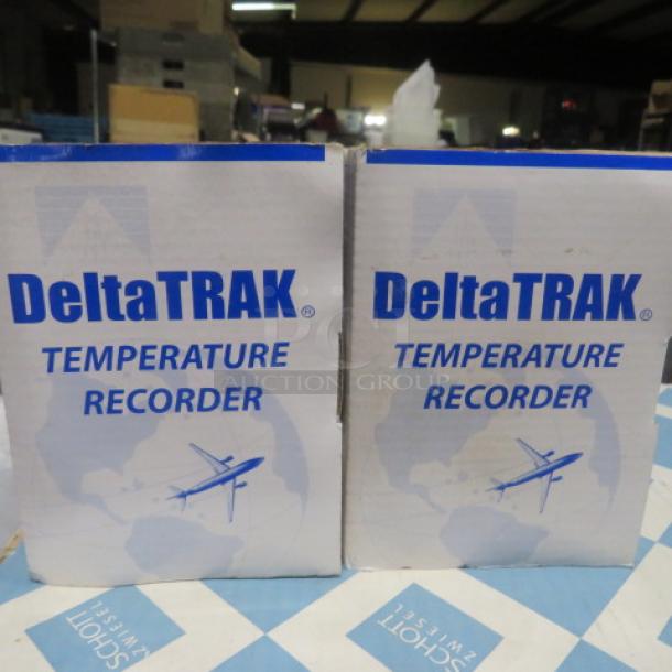 New DeltaTrak 5 Day Temperature Recorder in packaging, showing brand name and airplane graphic, excellent condition.
