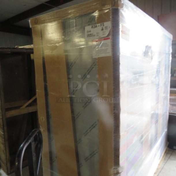 Hoshizaki 3-door stainless steel refrigerator, model R3A-FS, new in packaging, with nine wire shelves, on casters. Assembly required.