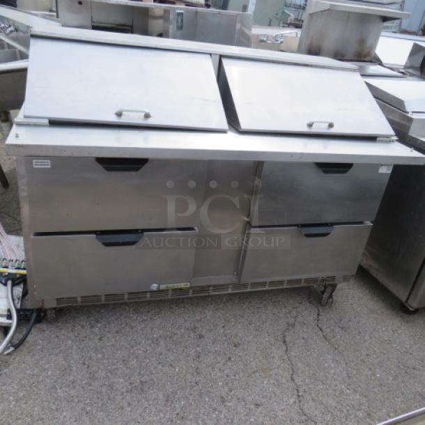 Beverage Air SPED60-24M-4 refrigerated prep table, 4 drawers, stainless steel, on casters, used condition, 60x34x46 inches.