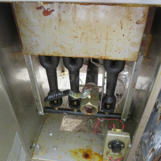 Royal natural gas deep fryer, model RFT50. Dimensions 15.5x30x45 inches. Showing interior components, visible wear.
