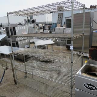 Metal Metro shelf unit with five adjustable wire shelves. Measures 60x24x75 inches. Used, with visible wear.