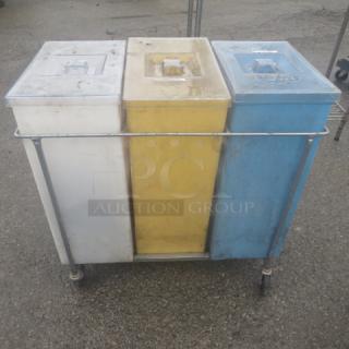 Three ingredient bins with lids, colored white, yellow, and blue, placed in a wire rack on casters, dimensions 29x15x29 inches.
