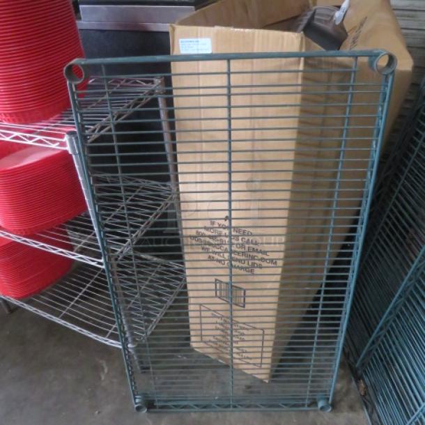 36x21 green coated Metro shelf, sturdy wire construction, excellent condition, ideal for storage solutions.