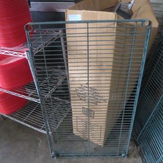 36x21 green coated Metro shelf, sturdy wire construction, excellent condition, ideal for storage solutions.