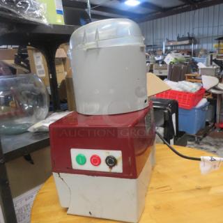 Robot Coupe R2BCLR food processor, 120 Volt, used condition with visible wear. Red and beige housing, power buttons visible.