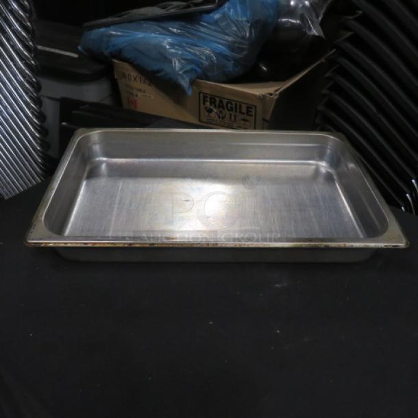 Full-size 2.5-inch deep hotel pan, stainless steel, used condition, ideal for catering or commercial kitchens.