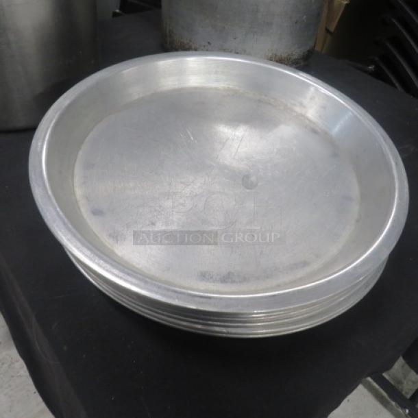 12 Inch Aluminum Pie Pan, model 9XBID, in good condition with visible surface scratches, suitable for baking.