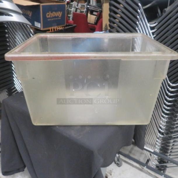 21.5-gallon clear food storage container, rectangular, used condition, no visible labels or markings.